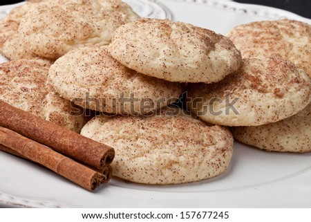 Platter of fresh from the oven cinnamon sugar Snickerdoodle cookies on a vintage plate