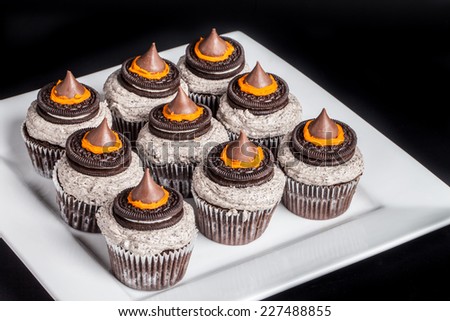 Top view of Halloween cupcakes with witches\' hats on top