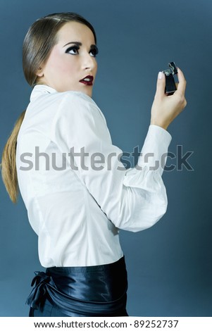 Portrait of a girl with a cigarette lighter in her hands