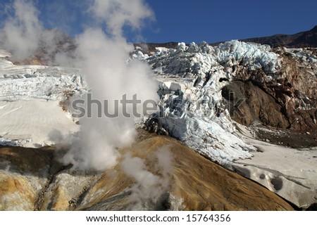 In crater acting vulcan possible to see blue ice and smoke.