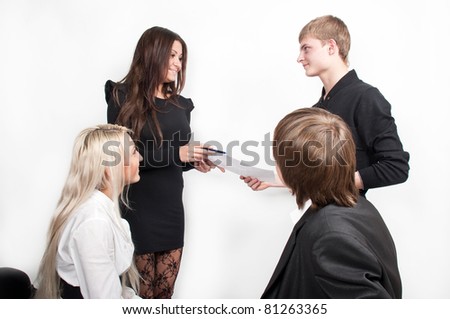 beautiful young caucasian business woman showing teaching material to staff four people training in corporations, corporate meeting, isolated over white