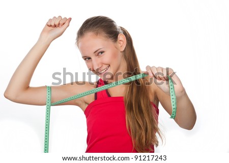 young beautiful girl with a measuring tape,centimeter, a fitness model, woman lose weight, beauty, isolated over white