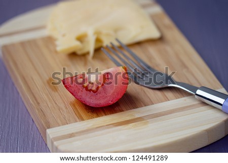 Raw macaroni and cheese on the board