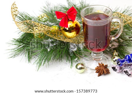Christmas mug with tea decorated  with red and green snowflakes pine and fir cone ornament