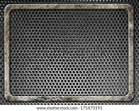 Steel frame bolted in grunge style on a background of black metal grilles
