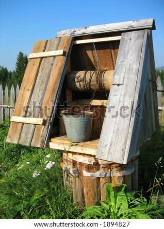 Wooden well in russian village