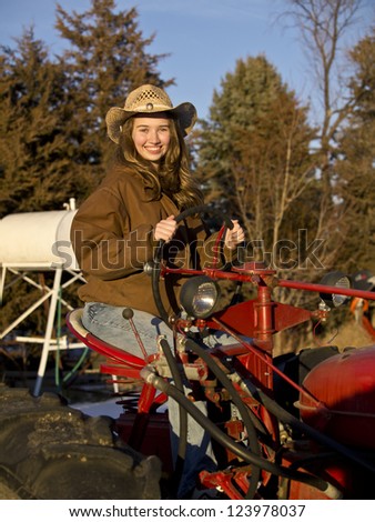 Woman on tractor