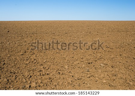 Brown soil land and blue sky landscape