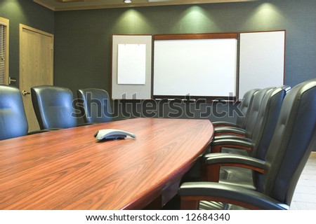 Conference table and blank presentation board