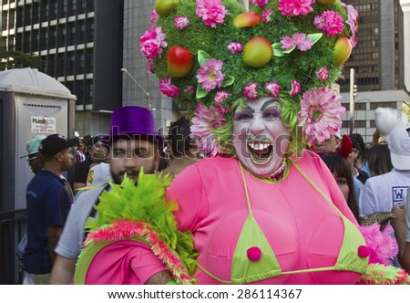 SAO PAULO, BRAZIL - June 7, 2015: An unidentified Drag Queen dressed in traditional costume celebrating lesbian, gay, bisexual, and transgender culture in the 19Âº Pride Parade Sao Paulo.