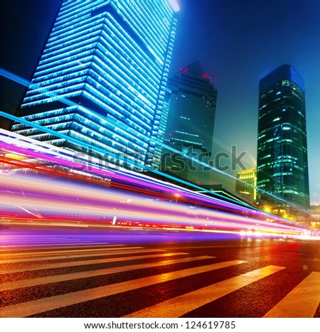 the light trails on the modern building background in shanghai china