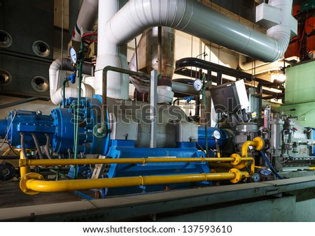 Modern Boiler Room Equipment For Heating System. Pipelines, Water Pump, Valves, Manometers.