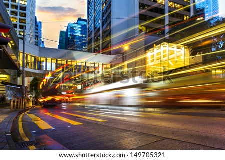 the light trails on the modern building background in Hong Kong China