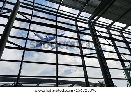 Transparent glass ceiling, modern architectural interior.