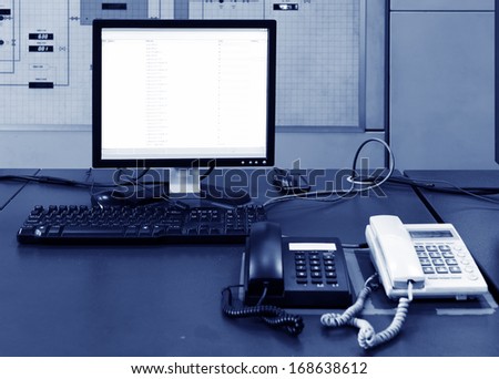 Computer and phone on the table in the lab