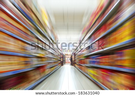 Wide perspective of empty supermarket aisle