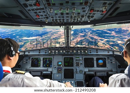 Pilots in the plane cockpit