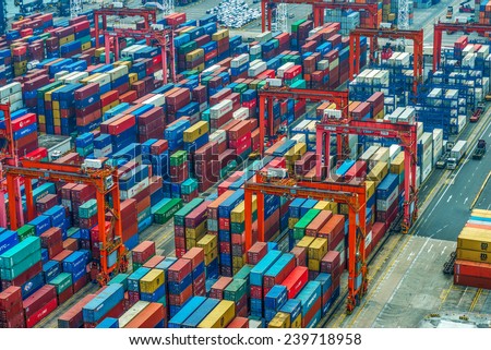 HONG KONG -Nov14: Containers at Hong Kong commercial port on Nov 14, 2014 in Hong Kong, China. Hong Kong is one of several hub ports serving more than 240 million tonnes of cargo during the year.