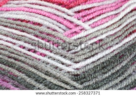 Woolen thread and knitting needle. Needlework accessories isolated on white background.