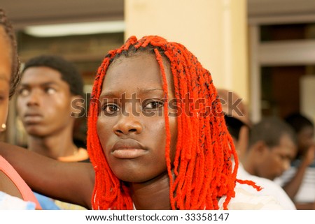 KINGSTOWN - JULY 7: Colorful hair worn by reveler during Carnival, one of the largest cultural events in the Caribbean  July 7, 2009 in Kingstown, St Vincent & the Grenadines.