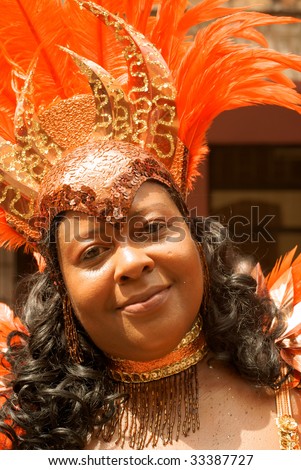 KINGSTOWN - JULY 7: Reveler enjoys Carnival, one of the largest cultural events in the Caribbean July 7, 2009 in Kingstown, St Vincent & the Grenadines.