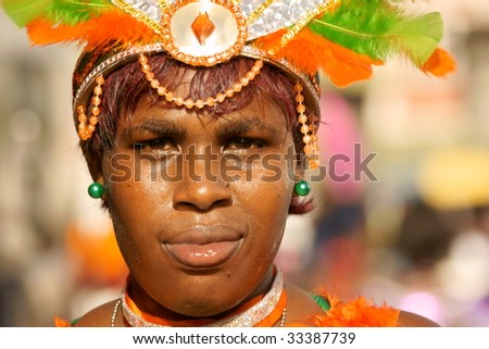KINGSTOWN - JULY 7: Reveler enjoys Carnival, one of the largest cultural events in the Caribbean July 7, 2009 in Kingstown, St Vincent & the Grenadines.
