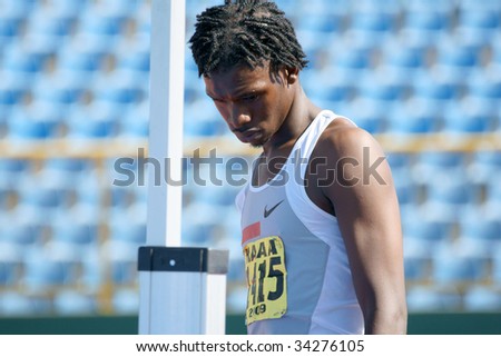 PORT OF SPAIN - JULY 26: Athlete contemplates next move during the 35th Hampton International Games July 26, 2009 in Port of Spain, Trinidad & Tobago.