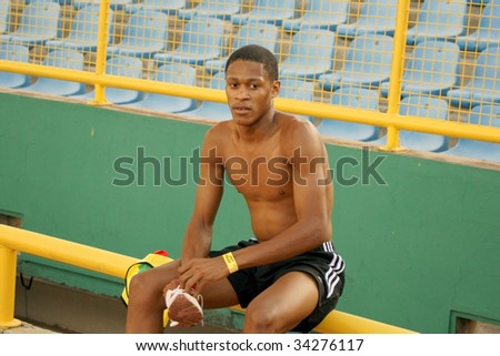 PORT OF SPAIN - JULY 26: Athlete relaxes after race during the 35th Hampton International Games July 26, 2009 in Port of Spain, Trinidad & Tobago.