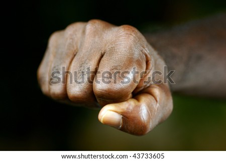 clenched fist of afro man