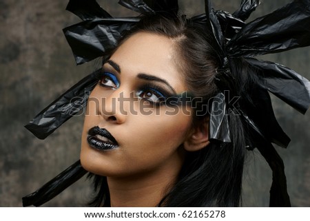 stock photo : edgy gothic dramatic Halloween makeup of young woman of East 