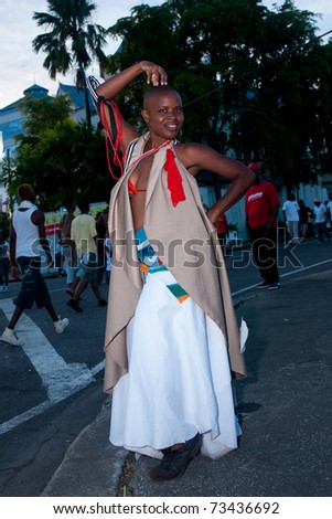 PORT OF SPAIN - MARCH 8: A dancer from the Vulgar Fraction Coalition enjoys Carnival, the largest cultural event in the Anglophone Caribbean March 8, 2011 in Port Of Spain, Trinidad & Tobago.