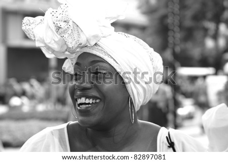 PORT OF SPAIN - AUGUST 1: Celebrating Emancipation Day which commemorates the abolition of Slavery August 1, 2011 in Port Of Spain, Trinidad & Tobago. Colorful & elaborate headpieces are usually worn.