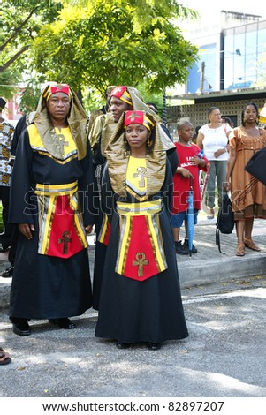 PORT OF SPAIN - AUGUST 1: Celebrating Emancipation Day which commemorates the abolition of Slavery August 1, 2011 in Port Of Spain, Trinidad & Tobago. Colorful & elaborate headpieces are usually worn.