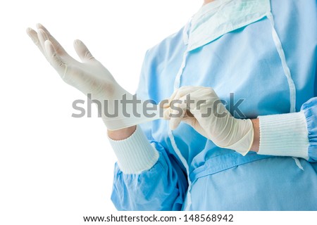 Doctor Putting On White Sterilized Surgical Glove