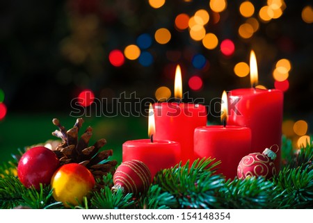 christmas background with four advent candles burning