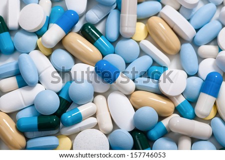 Heap of medicine pills.  Background made from colorful pills and capsules