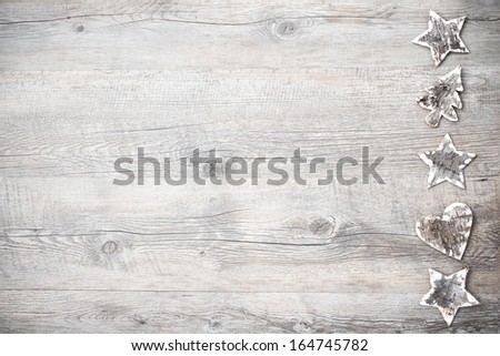 Christmas decoration from birch bark over the wooden background
