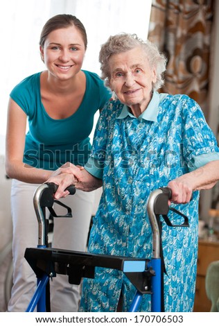 Senior woman with her caregiver at home Senior woman with her caregiver at home