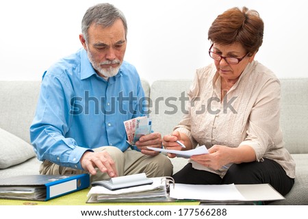 senior couple worrying about their money situation