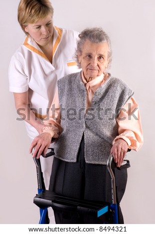 Health care worker and elderly woman needs help