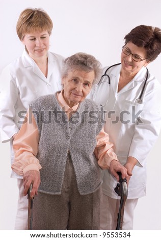 Health care workers and elderly woman needs help