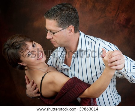 Attractive couple dancing