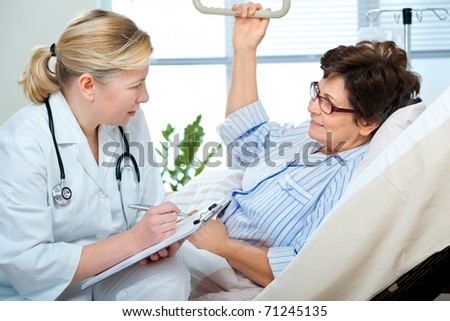 doctor or nurse talking to patient in hospital doctor or nurse talking to patient in hospital
