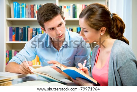 couple of students in a library
