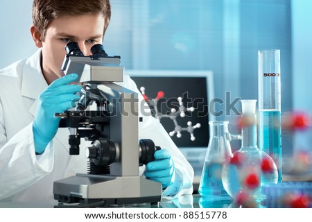 scientist working at the laboratory. Screen image of molecule made by myself
