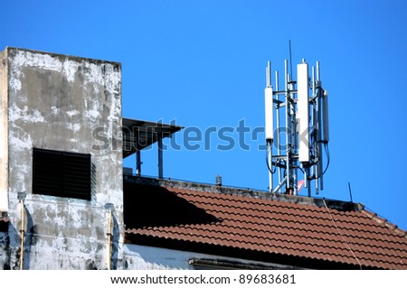 The cellular communication aerial on a building roof