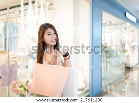 girl shopping at luxury mall in kowloon shanghai china