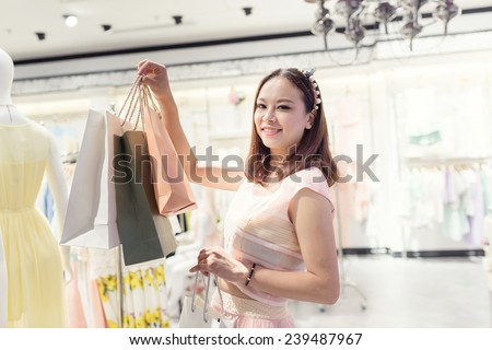 girl shopping at luxury mall in kowloon shanghai china