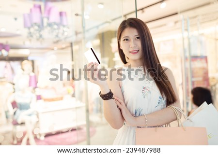 girl shopping at luxury mall in kowloon hong kong china