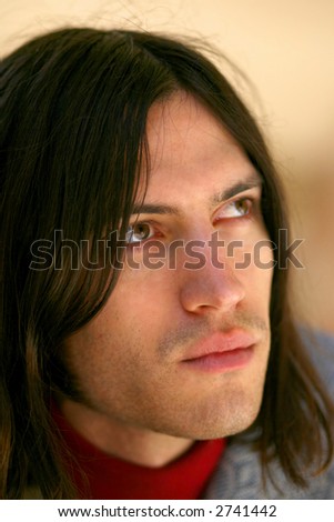 handsome man with long hair